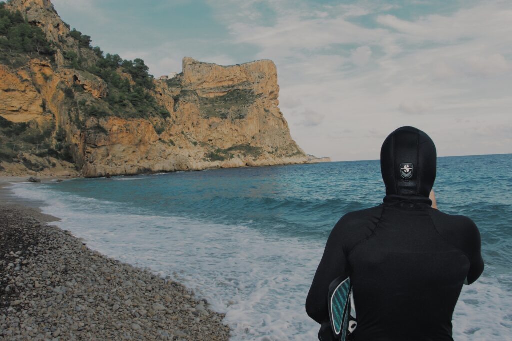 Image of a surfer with a clean wetsuit
